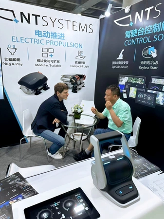 Visitor discussions at the NT Systems booth during Asia Yacht Expo 2026