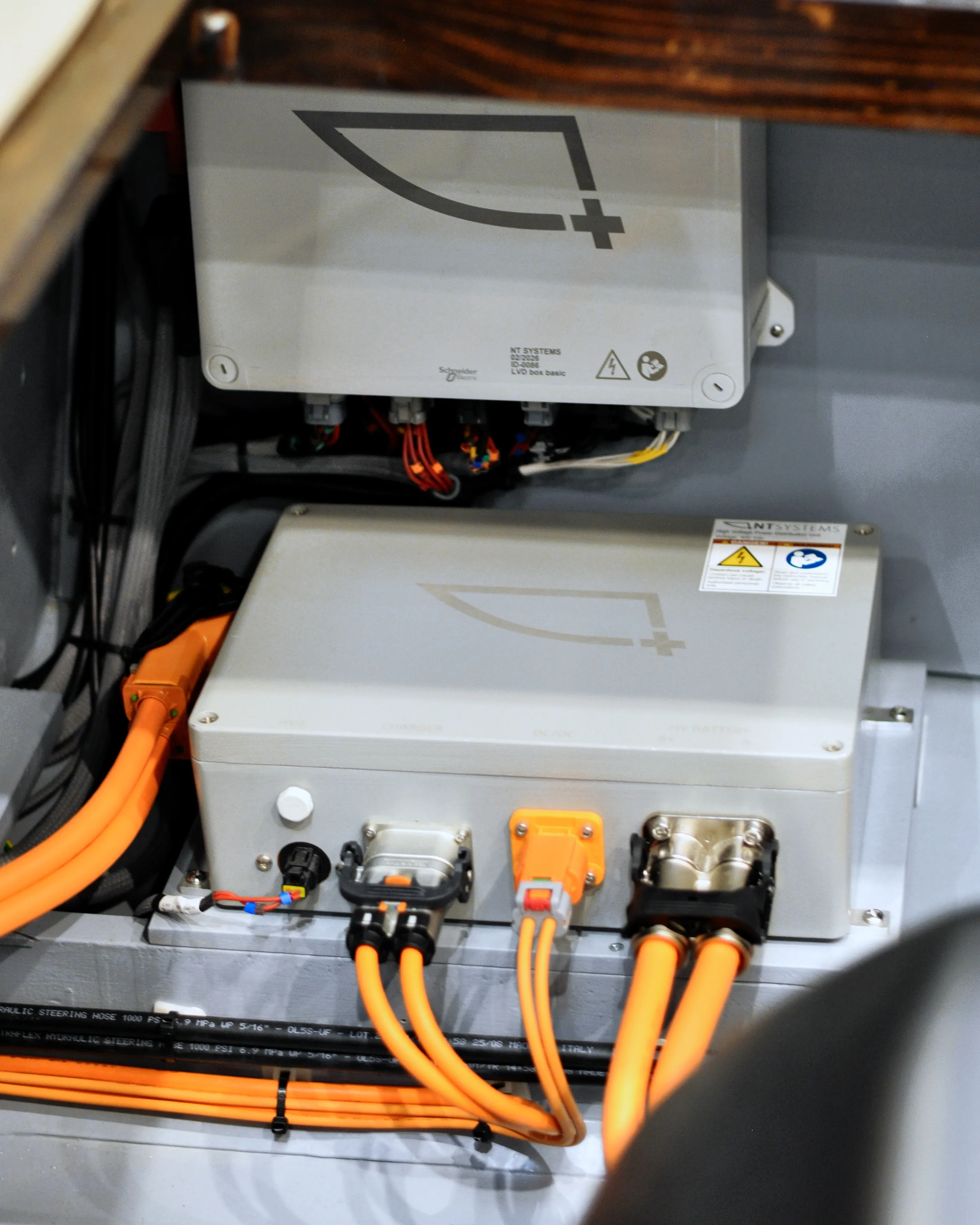 Electrical distribution boxes and prepared orange high-voltage cabling