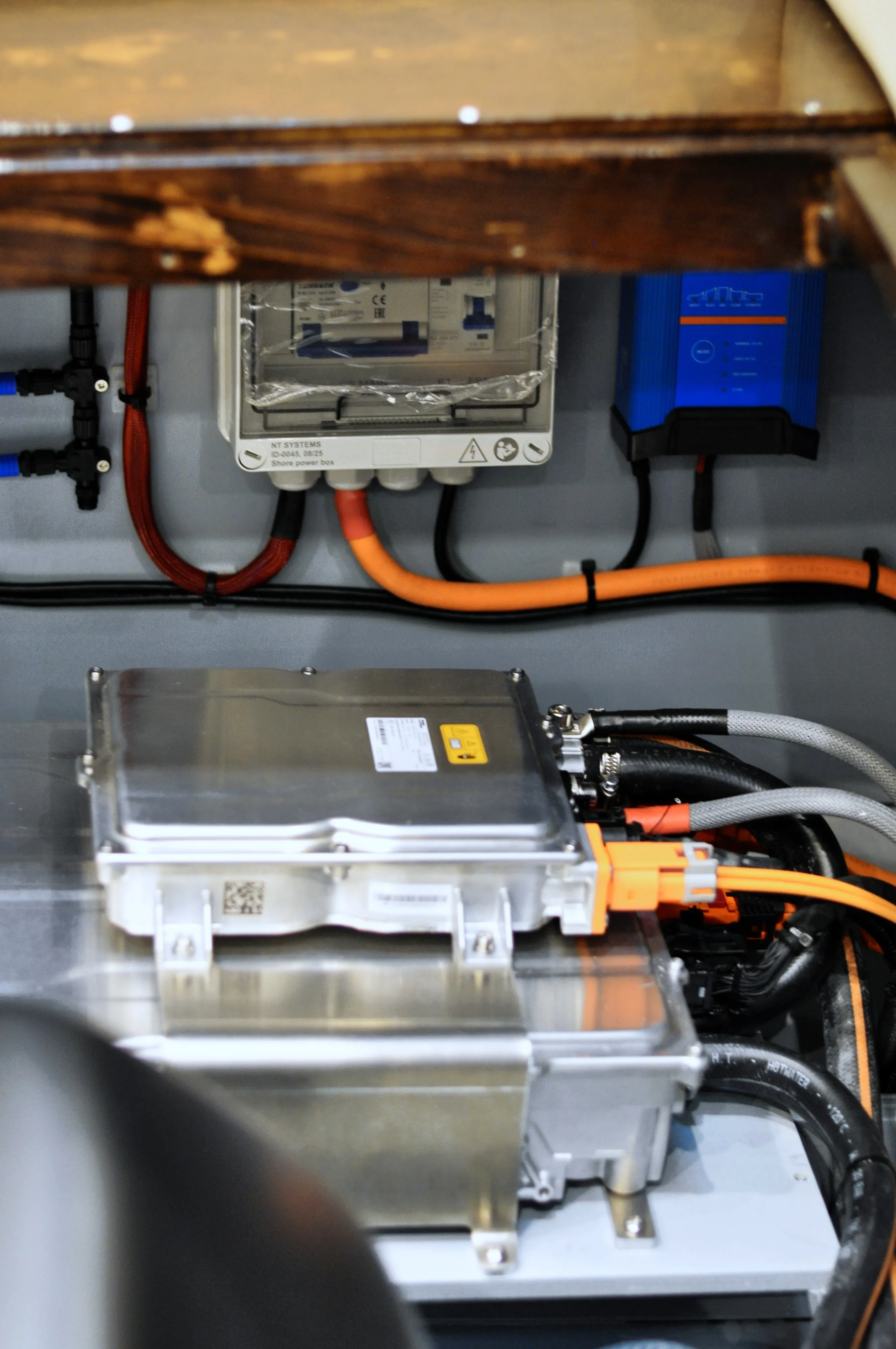 Electrical distribution, cabling, and propulsion components installed inside a boat