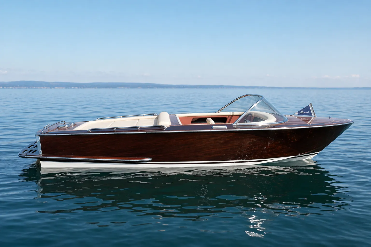 Renovated classic Boesch wooden boat shown from the side on calm water